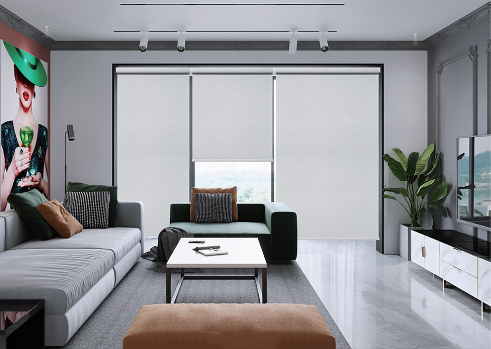 Modern living room with sleek furniture and large window blinds.