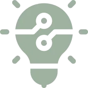 Light bulb with circuit design, dark background.
